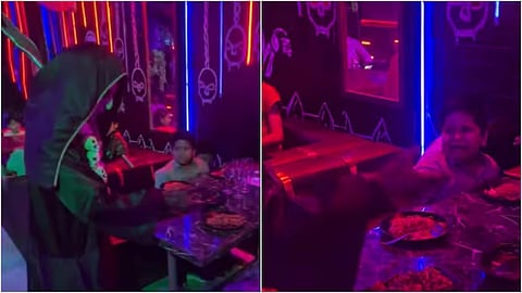 A viral video of a child being scared at a horror restaurant has sparked public outrage.