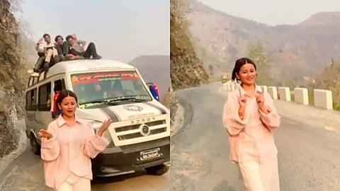A girl dancing on a road for a reel narrowly avoided an accident in a viral video.