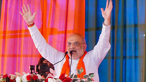 Amit Shah in Salboni slams Mamata Banerjee over Babri Masjid remarks and Women's Reservation Bill. Promises 7th Pay Commission, DA clearance, and ₹10L loans for youth.