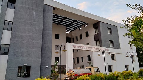 Baramati Municipal Council's general body meeting was postponed again due to the election code of conduct, putting 77 crucial civic development proposals on hold.