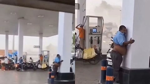 A man held onto a petrol pump pillar during a strong storm to avoid being blown away, and the funny video went viral.