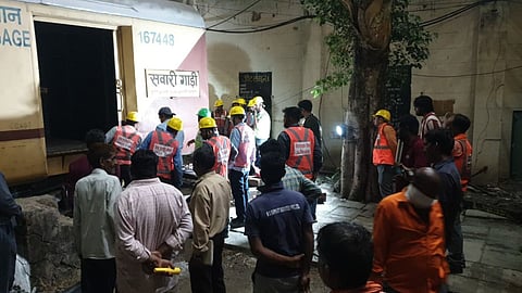 mpty Indore-Ujjain passenger train rake after hitting a buffer stop at Indore Railway Station pit line during maintenance operations.