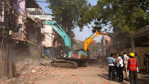 Indore Municipal Corporation carries out a removal drive from Gutkeshwar Temple to Sadar Bazar Road for the construction of a 60-foot-wide road aimed at easing traffic congestion.