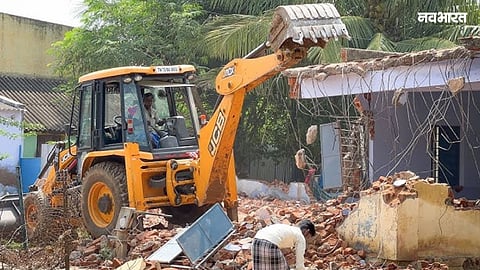 BMC cleared a 12-year-old encroachment from a 7,872 sq m plot reserved for a school and playground in Lalbaug-Parel, paving the way for public projects.