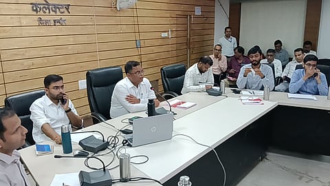 Indore Collector Shivam Verma chairs the TL review meeting, directing strict action against illegal colonies