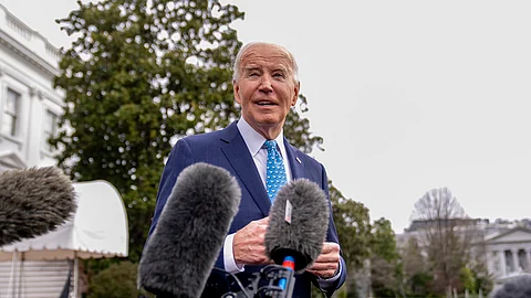 President Joe Biden speaks to members of the media before boarding Marine One on the South Lawn of the White House in Washington, Tuesday, Jan. 30, 2024, for a short trip to Andrews Air Force Base, Md., and then on to Florida for campaign receptions.