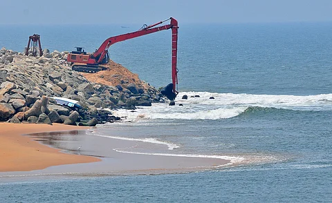 Removal of sediments and sand at Muthalapozhy harbour mouth.