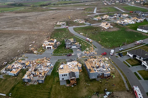 Damaged houses are seen after a tornado passed through the area near Omaha, Neb., on Friday, April 26, 2024.