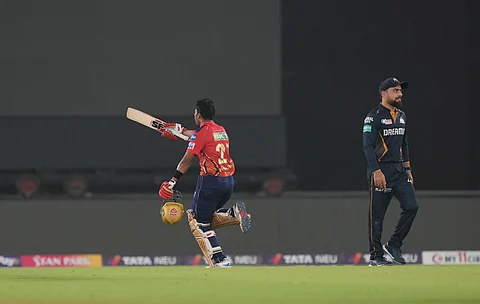 Punjab Kings' Shashank Singh celebrates after winning the Indian Premier League (IPL) 2024 T20 cricket match between Gujarat Titans and Punjab Kings at the Narendra Modi Stadium, in Ahmedabad, Thursday, April 4, 2024.