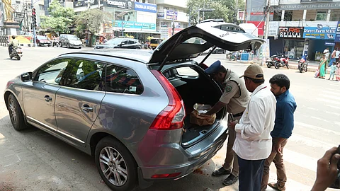 Police Conduct Vehicle checks to prevent illegal transport of money and liquor ahead of elections at Seethammadhara in Visakhapatnam on Sunday
