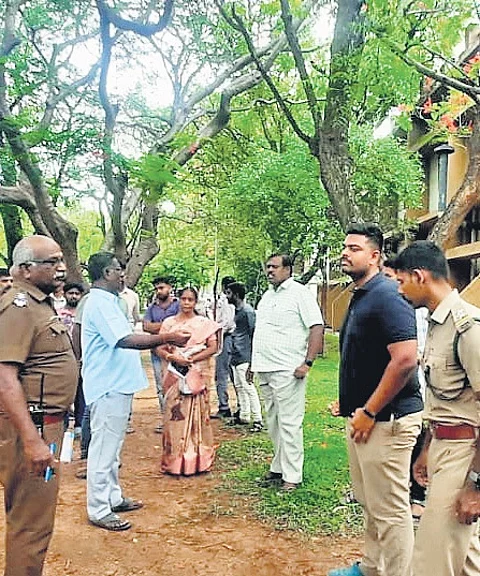 Forest officials on the university campus on Thursday