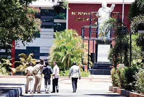 Officials of Special Investigation Team inspect various places at Sri Padmavati Mahila Visva Vidyalayam in Tirupati on Sunday as part of their probe into poll violence