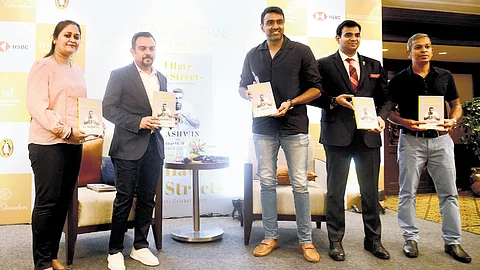 R Ashwin (C) during the book launch in the city on Friday