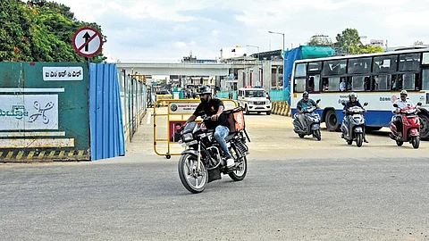 Vehicles ply on Kamaraj Road, after it was opened to traffic in one direction, after five years, in Bengaluru on Friday