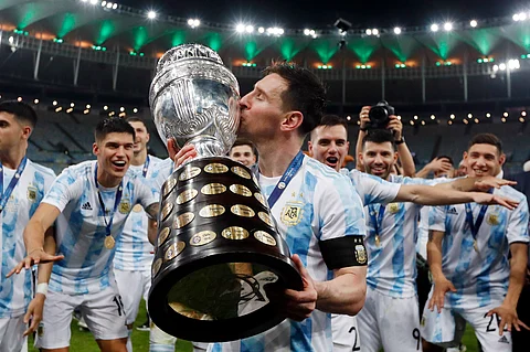 Argentina's Lionel Messi kisses the trophy after beating Brazil 1-0 in the 2021 Copa America final