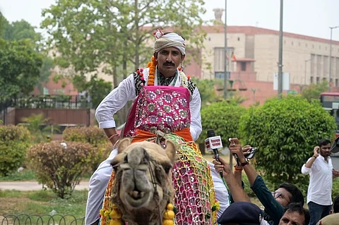 Bharat Adivasi Party MP Rajkumar Roat from Rajasthan arrives at the Parliament House complex during the first session of the 18th Lok Sabha, in New Delhi.