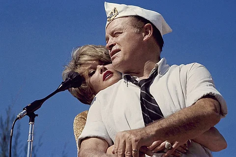 Bob Hope and Janis Paige hug during the annual Christmas show in Saigon, Vietnam, Dec. 25, 1964.