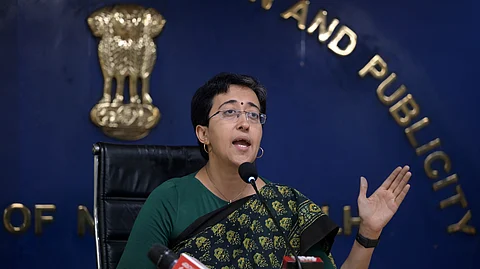 Delhi Minister Atishi addresses a press conference on water issue in New Delhi.