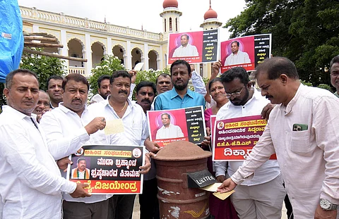 Karnataka Backward Classes Awareness Forum members launched postal campaign demanding open discussion on the MUDA scam in Mysuru