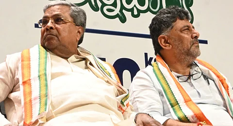 Chief Minister Siddaramaiah with DCM D K Shivakumar during Guarantee Schemes Implementation Committee meeting at KPCC.