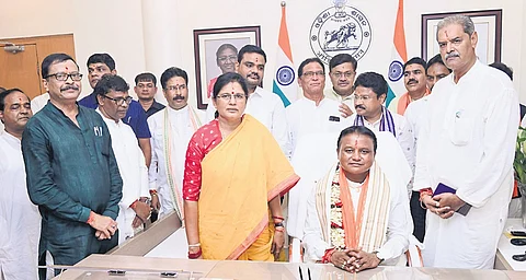 Chief Minister Mohan Majhi, Deputy CMs KV Singh Deo and Pravati Pariada along with ministers pose for photographs at the CMO in Lok Seba Bhavan on Thursday