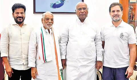 Rajya Sabha member K Keshava Rao poses for a picture with AICC president Mallikarjun Kharge, Leader of the Opposition in the Lok Sabha Rahul Gandhi and Chief Minister A Revanth Reddy after joining the Congress in New Delhi on Wednesday