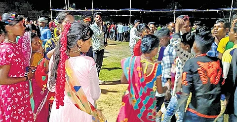 Young boys and girls marrying the person of their choice on the first day of Rath Yatra at Palabani Durga Puja field in Baripada