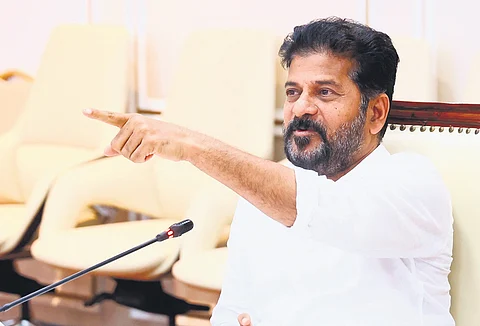 Chief Minister A Revanth Reddy gestures during a review meeting with officials
of various departments at the Secretariat on Thursday