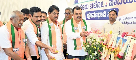BJP leaders Byrathi Basavaraj, BY Vijayendra, R Ashoka, Sunil Kumar and others at a party event in Bengaluru on Monday.