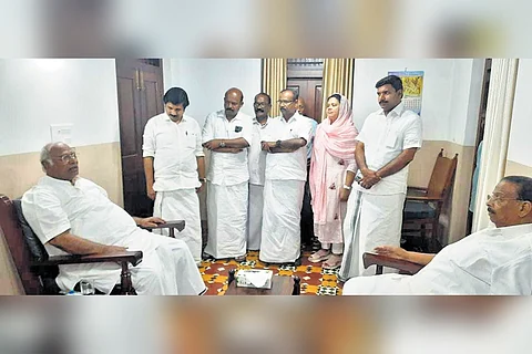 State Congress chief K Sudhakaran interacts with party national president Mallikarjun Kharge at AVS Ayurveda Hospital in Kottakkal on Sunday