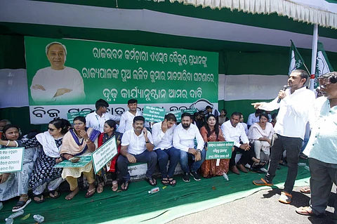 Biju Yuba Chhatra Janata Dala leaders and supporters protest against physical assault on an ASO by Governor's son at Governor Square in Bhubaneswar.