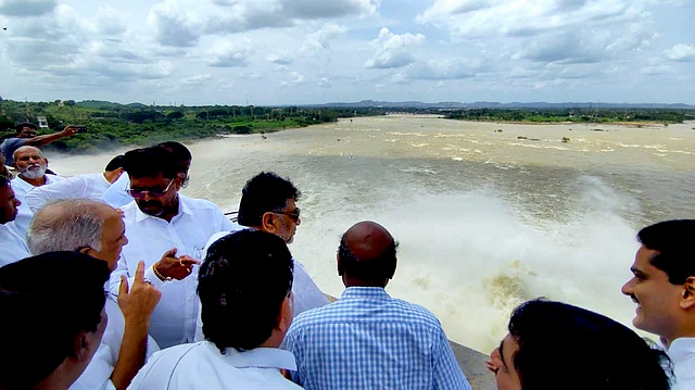 Karnataka Deputy CM D.K. Shivakumar visit the Tungabhadra dam after the chain of a crust gate of the dam broke, leading to the release of huge amount of water