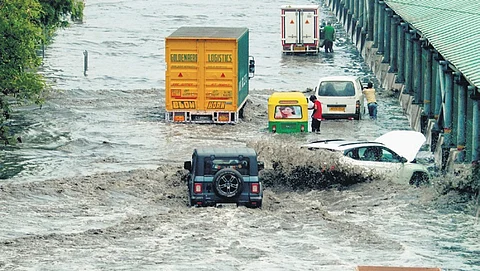 Vehicles on waterlogged Delhi-Gurugram Expressway in Gurugram