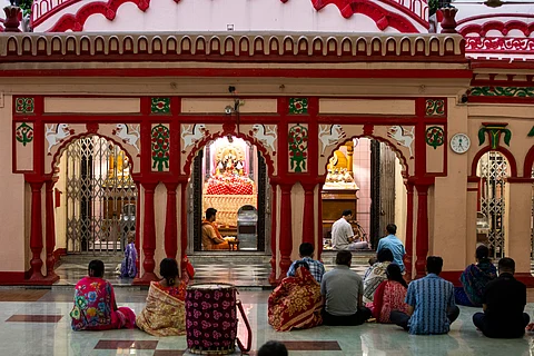 Hindu devotees pray at the Dhakeshwari National Temple in Dhaka, Bangladesh, Sunday, Aug.11, 2024.