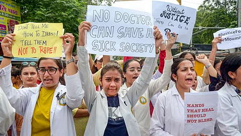 Doctors and medical students stage a protest amid the 24-hour nationwide strike called by the Indian Medical Association (IMA) demanding justice for the woman doctor who was allegedly raped and murdered at Kolkata's R G Kar Medical College and Hospital, in Amritsar, Saturday, Aug. 17, 2024.
