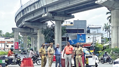 Tripunithura Joint RTO Abdul Rahman and SiRST director G Adarsh Kumar discuss the measures to decongest Pettah Junction during a joint inspection on Wednesday