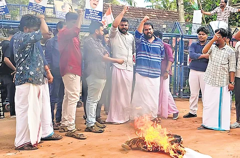 Youth Congress members protest against MLA M Mukesh in Kollam on Wednesday