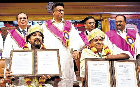 Music composer Gurukiran (seated, left) and former commissioner of Disability Rights Department, KS Rajanna, receive honorary doctorates from Higher Education Minister MC Sudhakar on Tuesday