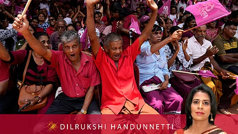 Supporters of National People's Power cheer their leader and presidential candidate Anura Kumara Dissanayake during a public rally in Dehiowita, Sri Lanka, Tuesday, Sept. 17, 2024.