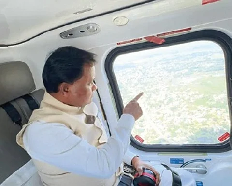 CM Mohan Charan Majhi assessing flood damage from air