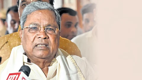 Chief Minister Siddaramaiah arrives for a meeting at Vidhana Soudha in Bengaluru on Wednesday