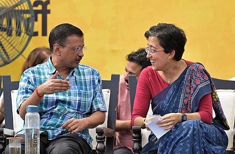 Delhi Chief Minister Atishi and AAP national convener Arvind Kejriwal during the 'Janta Ki Adalat' event, in New Delhi on Sunday, Oct. 6, 2024.Express
