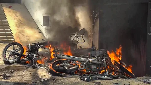 Motorbikes burnt following Sunday night violence during goddess Durga idol immersion, in Bahraich
