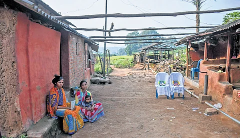 Family members of the deceased women sit outside their house at Mandipanka village in Kandhamal district | debadatta mallick