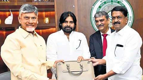 Finance minister Payyavula Kesav with Chief Minister N Chandrababu Naidu and Deputy Chief Minister Pawan Kalyan before introducing the Budget for FY2024-25 in the State Legislative Assembly on Monday