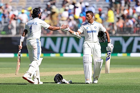 KL Rahul, left, and teammate Yashasvi Jaiswal prepare to leave the field for the tea break on the second day of the first cricket test between Australia and India in Perth, Australia on Saturday.