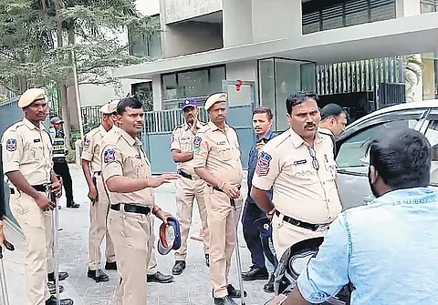 Police personnel stand outside BRS MLA T Harish Rao’s house in Hyderabad