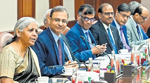 Finance minister Nirmala Sitharaman, RBI Governor Sanjay Malhotra and directors during meeting of Central Board of Directors of RBI, in New Delhi, Saturday.