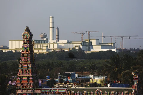 A temple stands in the foreground of the Madras Atomic Power Station located at Kalpakkam in Tamil Nadu, Monday, Feb 10, 2025.