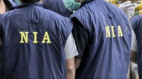 NIA on Thursday raided the premises of a local communication centre in McLeodganj and arrested its owner on charges of human trafficking.